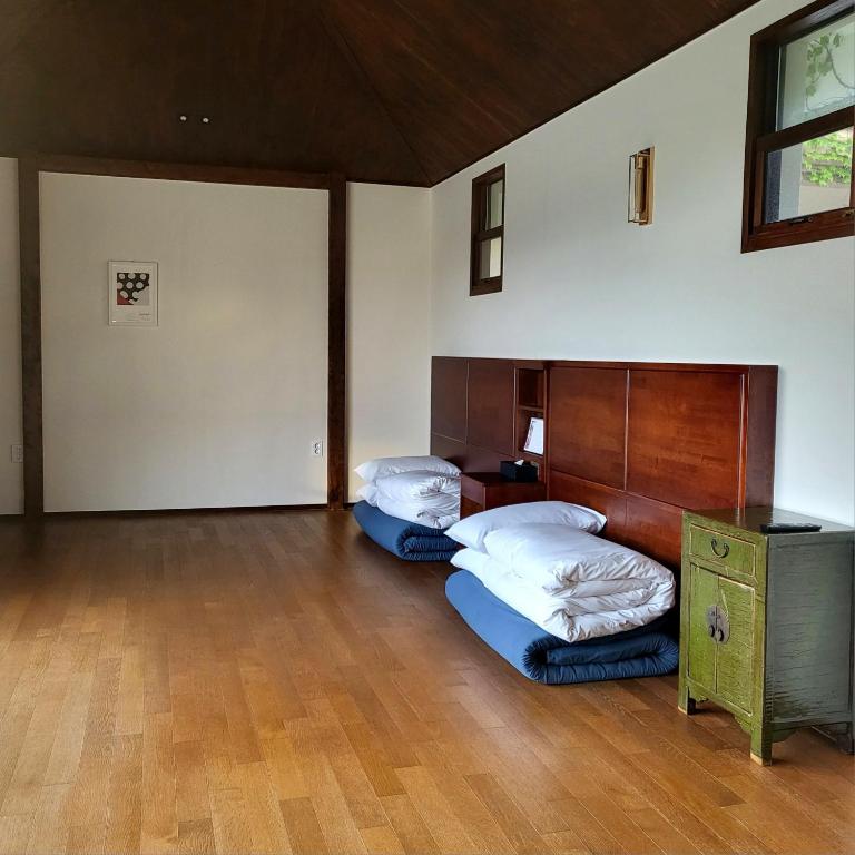 Postel nebo postele na pokoji v ubytování Olle Resort