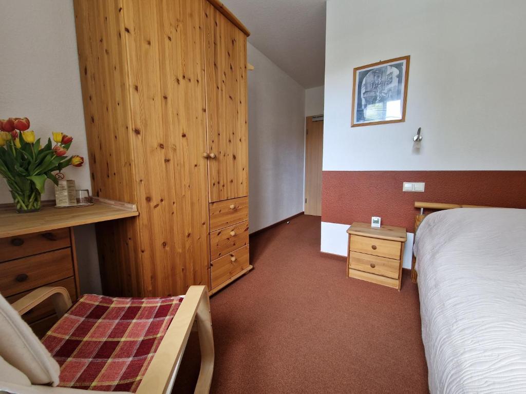 Postel nebo postele na pokoji v ubytování Garni Hotel Zum Hothertor