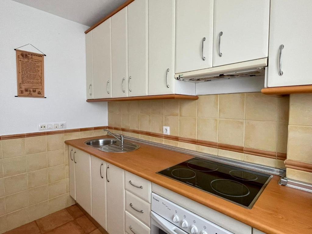 Kuchyň nebo kuchyňský kout v ubytování Apartamento Campo de Golf