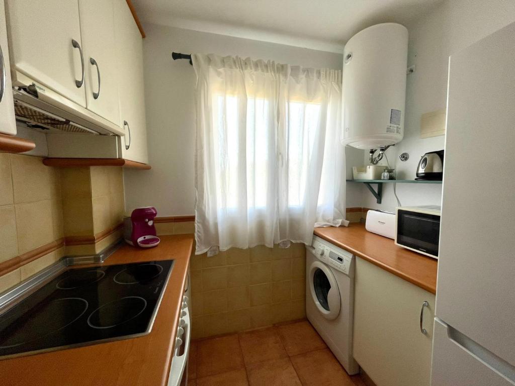 Kuchyň nebo kuchyňský kout v ubytování Apartamento Campo de Golf