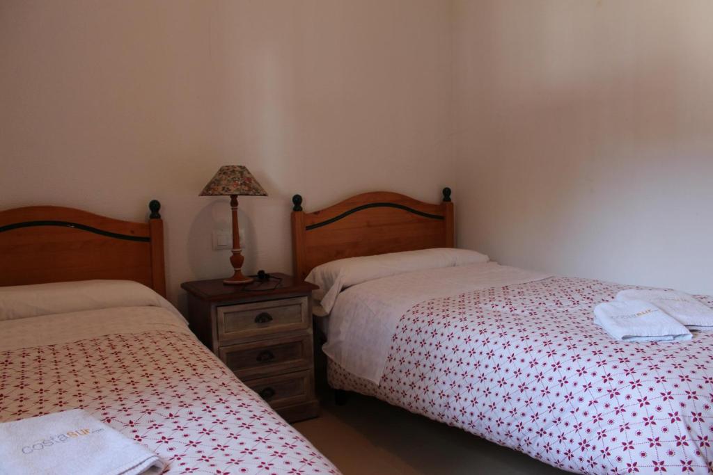 Postel nebo postele na pokoji v ubytování Chalet Violeta
