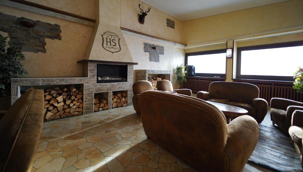 Posezení v ubytování Hotel lo Stambecco