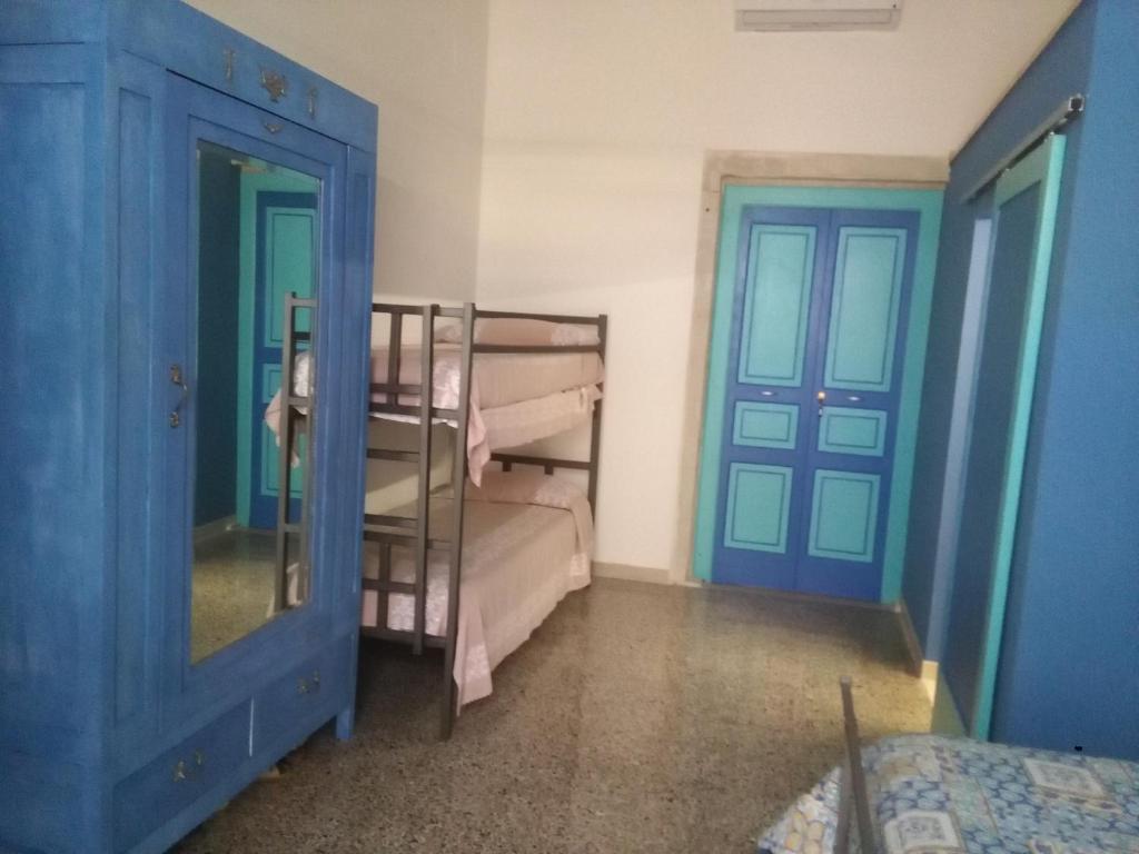Postel nebo postele na pokoji v ubytování A Casa di Lu