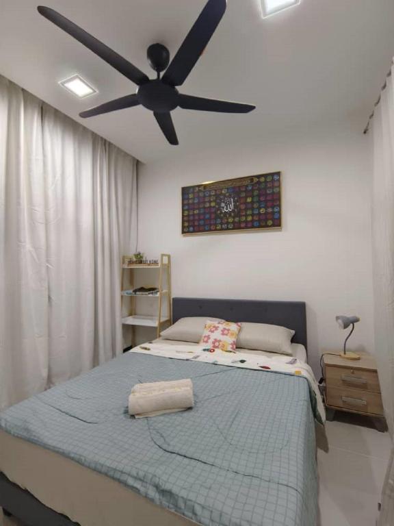 Katil atau katil-katil dalam bilik di Relaxing Suite @Suzana The Shore Kota Kinabalu