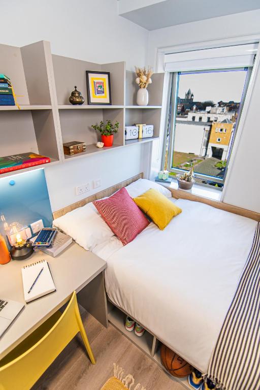 Postel nebo postele na pokoji v ubytování Heyday Student Accommodation