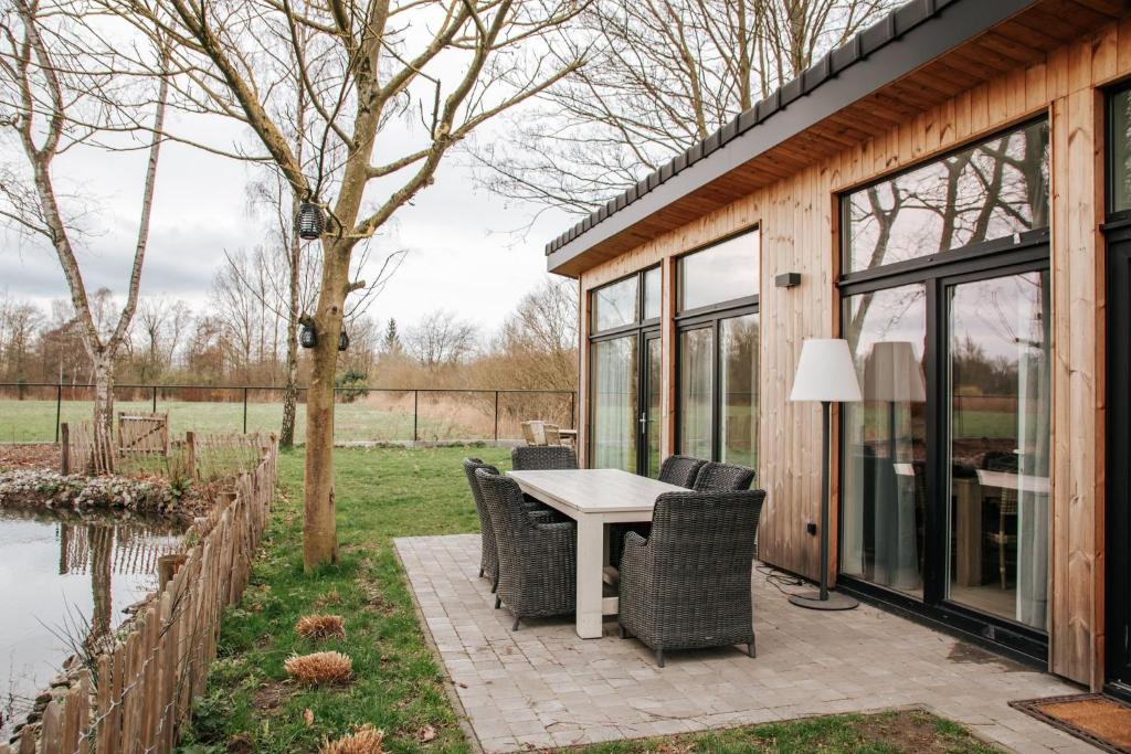 Zahrada ubytování Trendy chalet aan visvijver