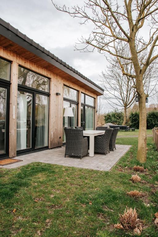 Zahrada ubytování Trendy chalet aan visvijver
