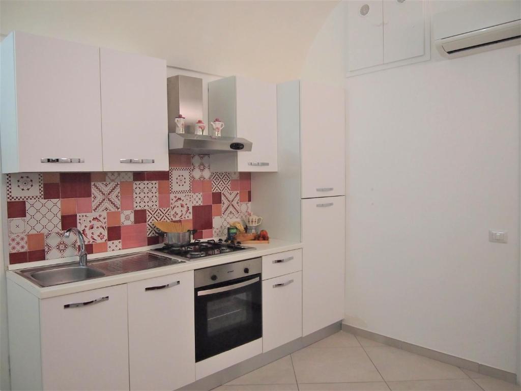 Kuchnia lub aneks kuchenny w obiekcie Casa dei Gemelli