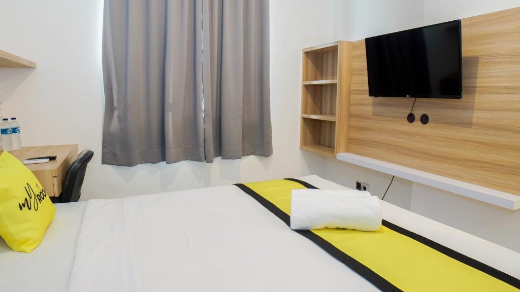 TV a/nebo společenská místnost v ubytování My Rooms at Paskal Hyper Square
