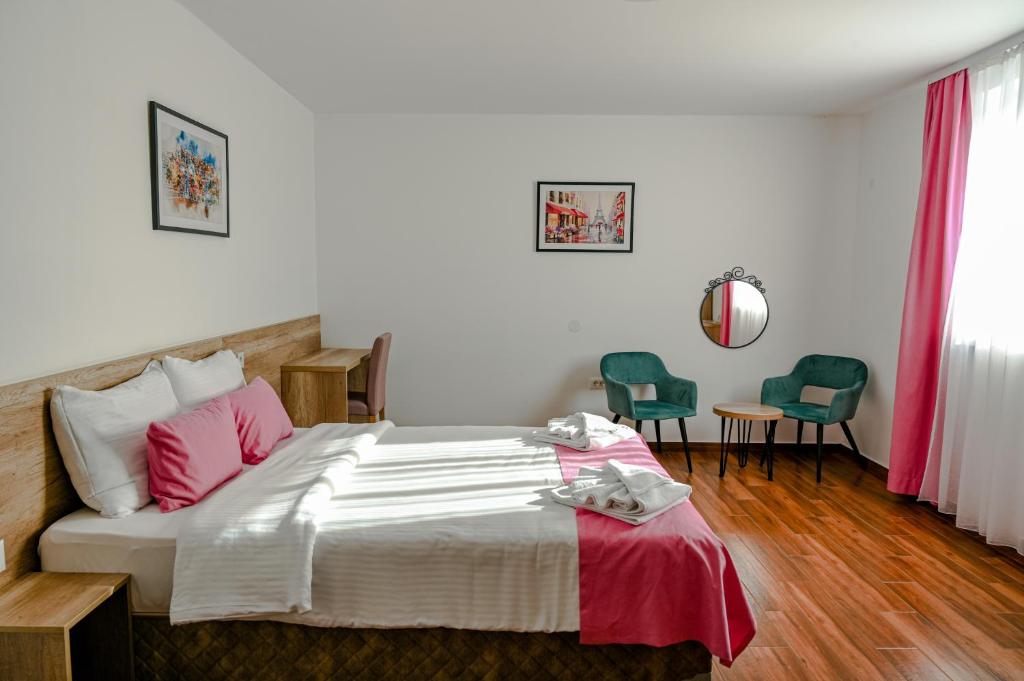 Postel nebo postele na pokoji v ubytování Dona, Altina