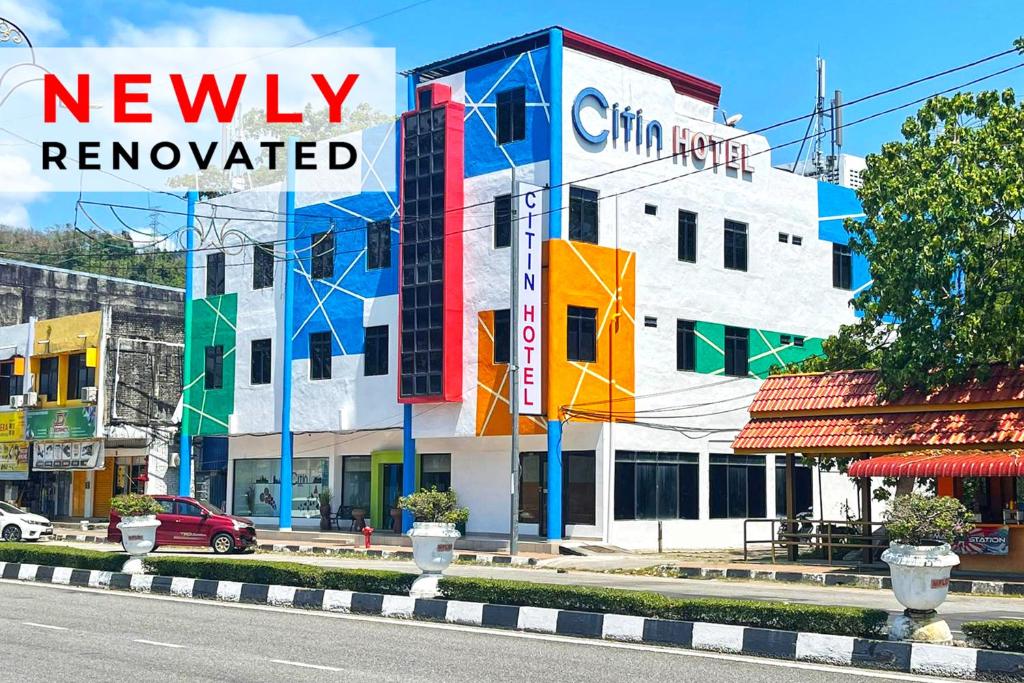 a building with a sign that reads newly renovated at Citin Langkawi by Compass Hospitality in Kuah