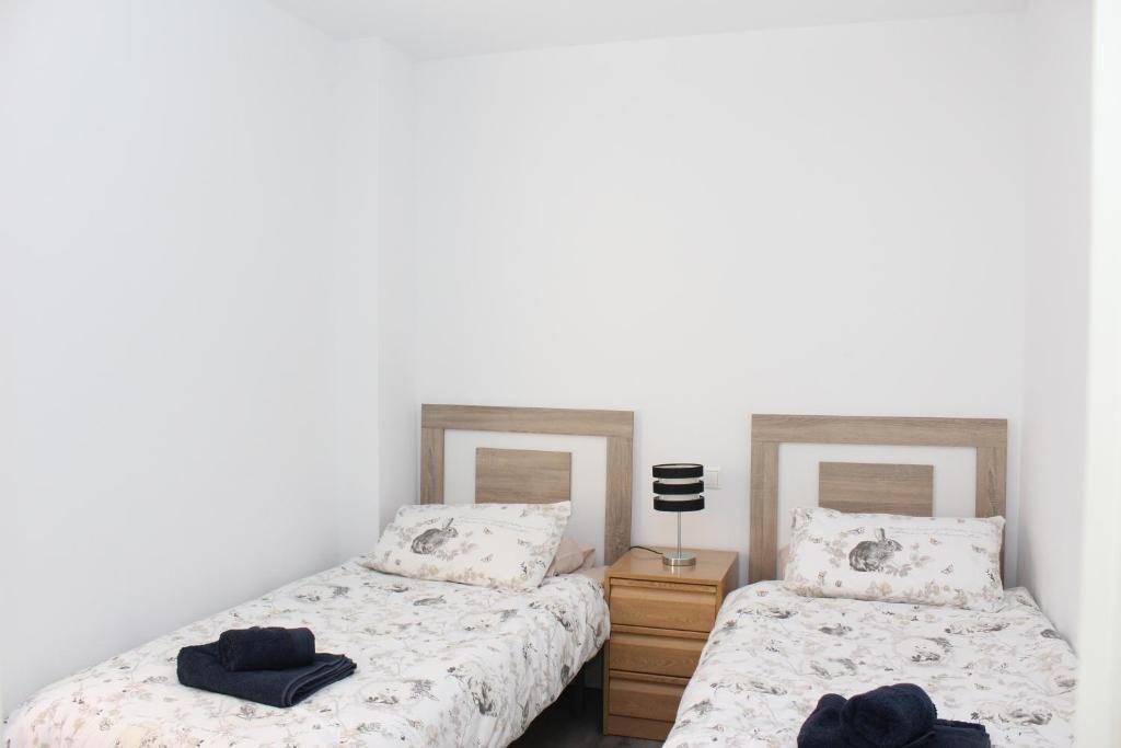 Postel nebo postele na pokoji v ubytování Stay El Rincon