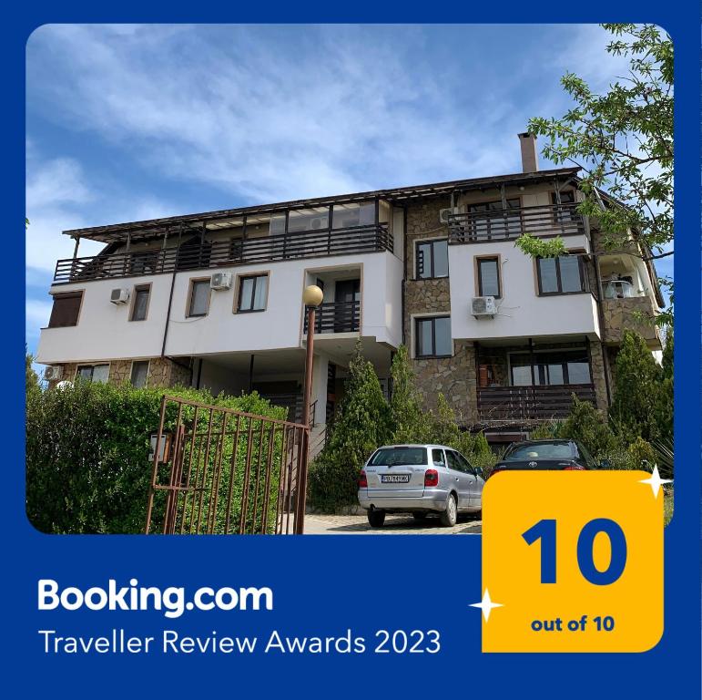 a house with a car parked in front of it at Апартамент Silver Star in Sozopol