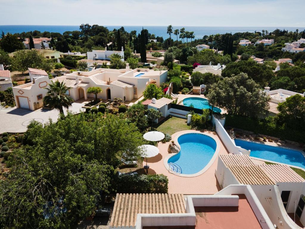 an aerial view of a villa with a swimming pool at The Carobs Villa in Carvoeiro