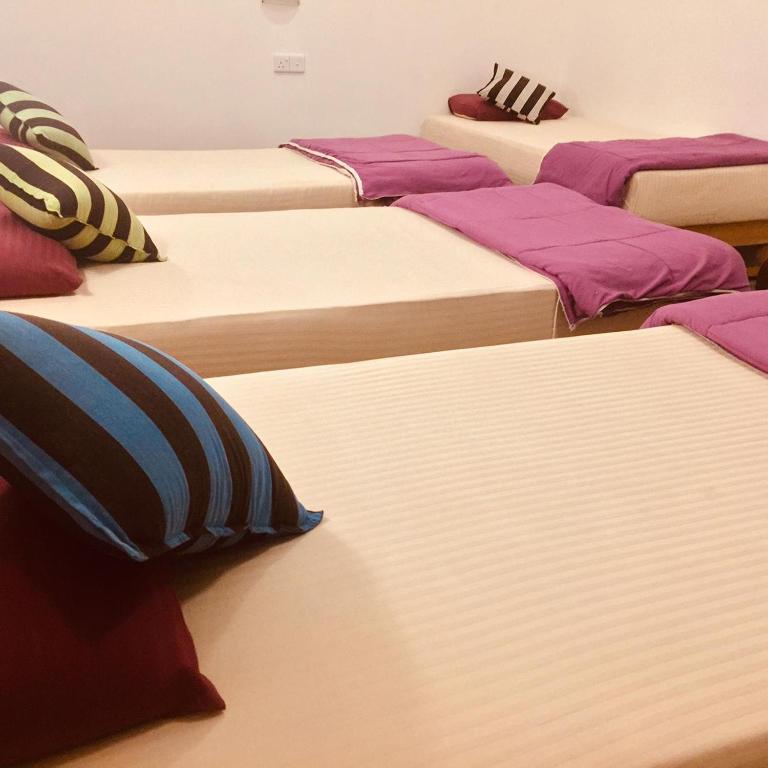 Postel nebo postele na pokoji v ubytování Tiki bar hostel ella