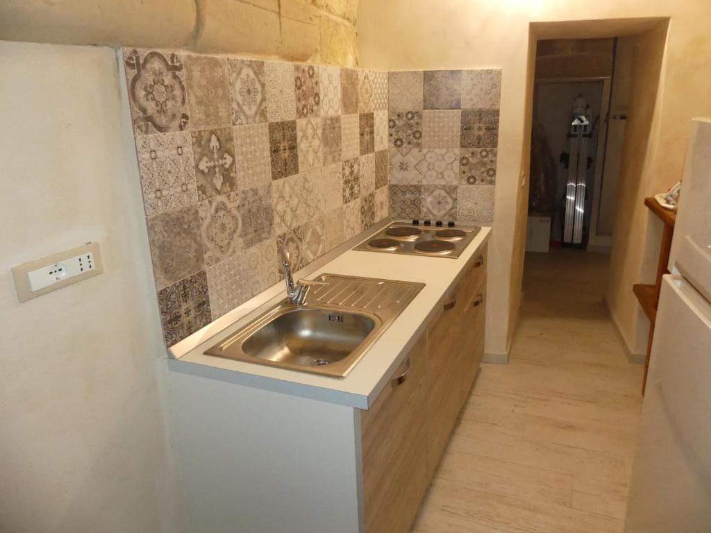 Kuchyň nebo kuchyňský kout v ubytování A Casa di Lu