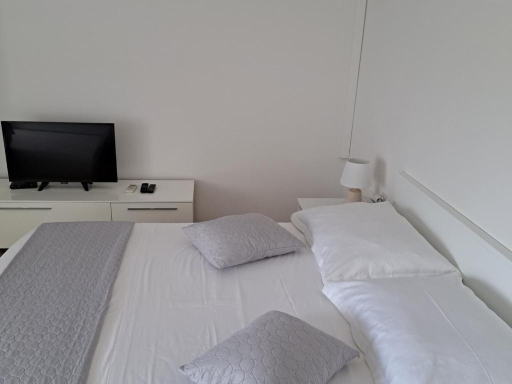 Postel nebo postele na pokoji v ubytování Beach seaview apartment