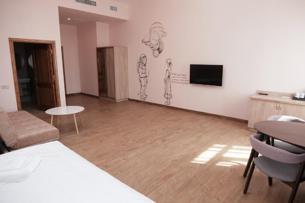 TV a/nebo společenská místnost v ubytování KUMA Hotel Gyumri