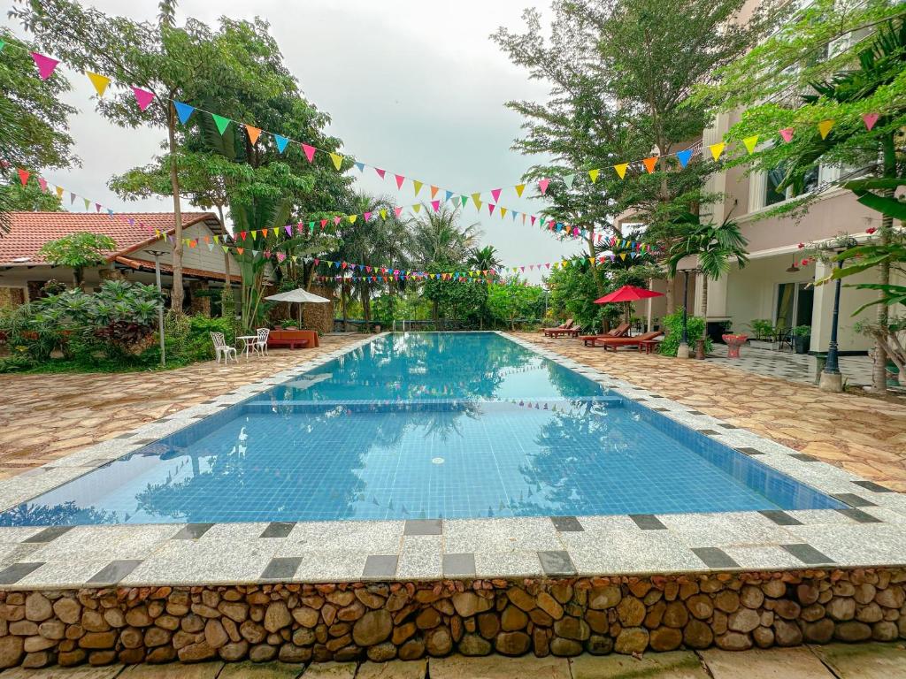Bazén v ubytování Summer Resort nebo v jeho okolí