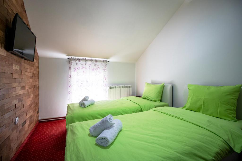 Postel nebo postele na pokoji v ubytování Hostel Aurora