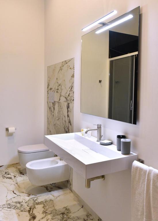 Koupelna v ubytování Hotel Exclusive