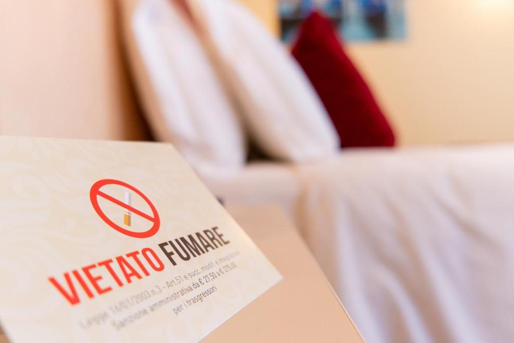 a sign that says welcome to a hotel room at Hotel Autoespresso Venice - Atika & Atif in Marghera