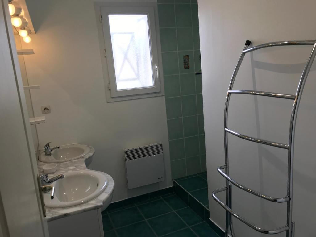 Kúpeľňa v ubytovaní Résidence les Trémières