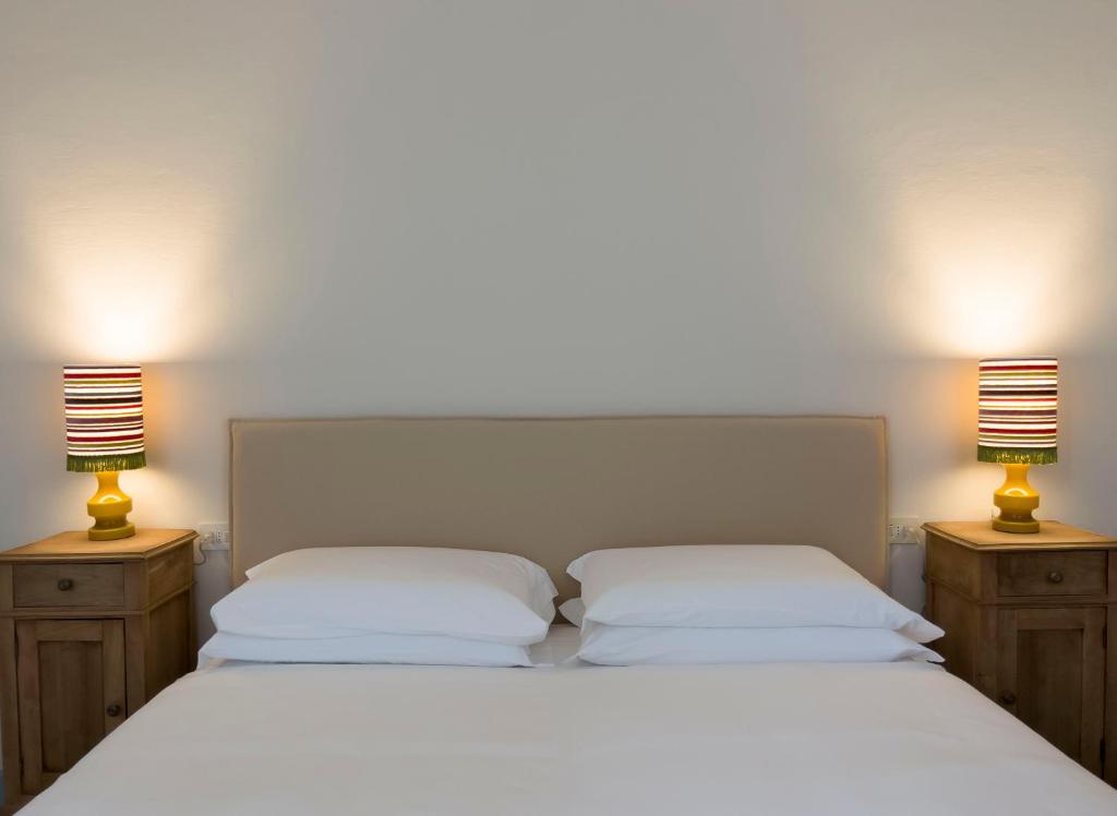Postel nebo postele na pokoji v ubytování CasaZavi