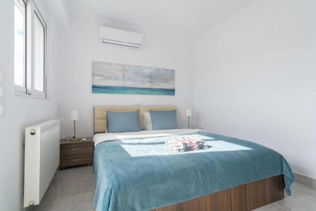 Postel nebo postele na pokoji v ubytování New spacious apartment located in Piraeus