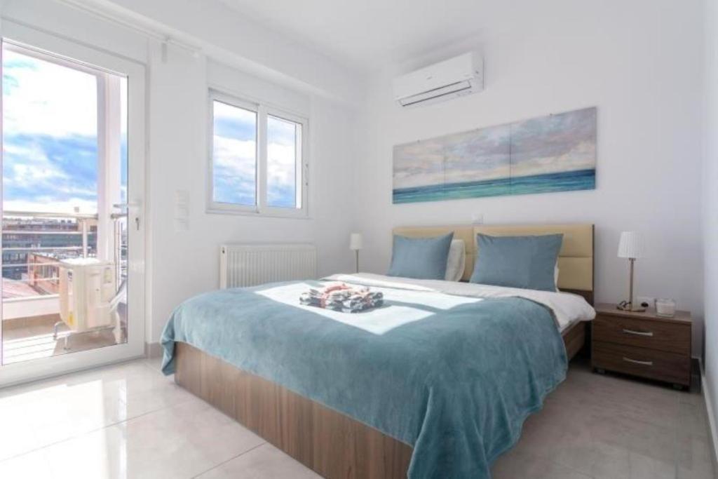 Postel nebo postele na pokoji v ubytování New spacious apartment located in Piraeus