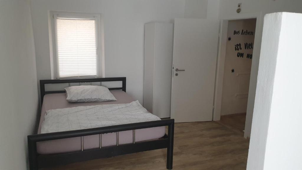 Postel nebo postele na pokoji v ubytování Ferienhaus Im Gäßchen