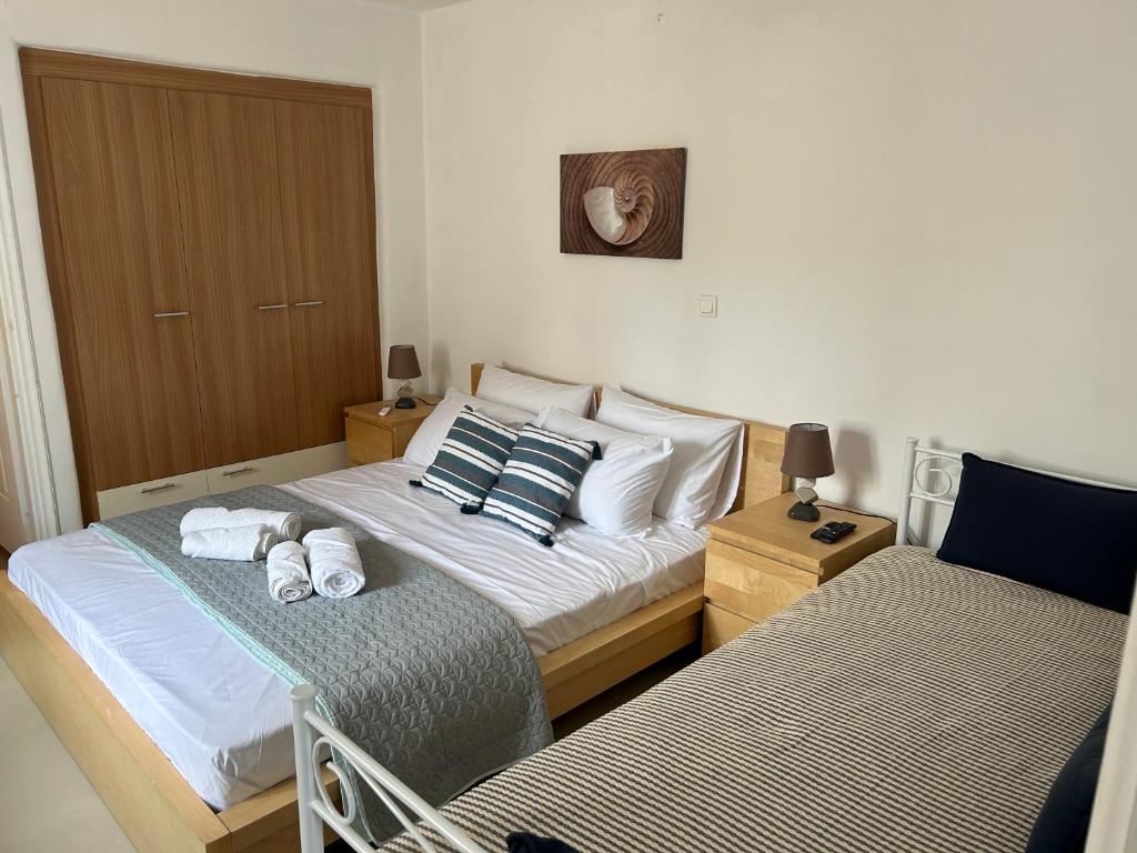 Voodi või voodid majutusasutuse Aretousa Residence in Naoussa, Paros toas