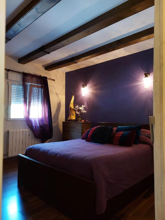 A bed or beds in a room at Raices