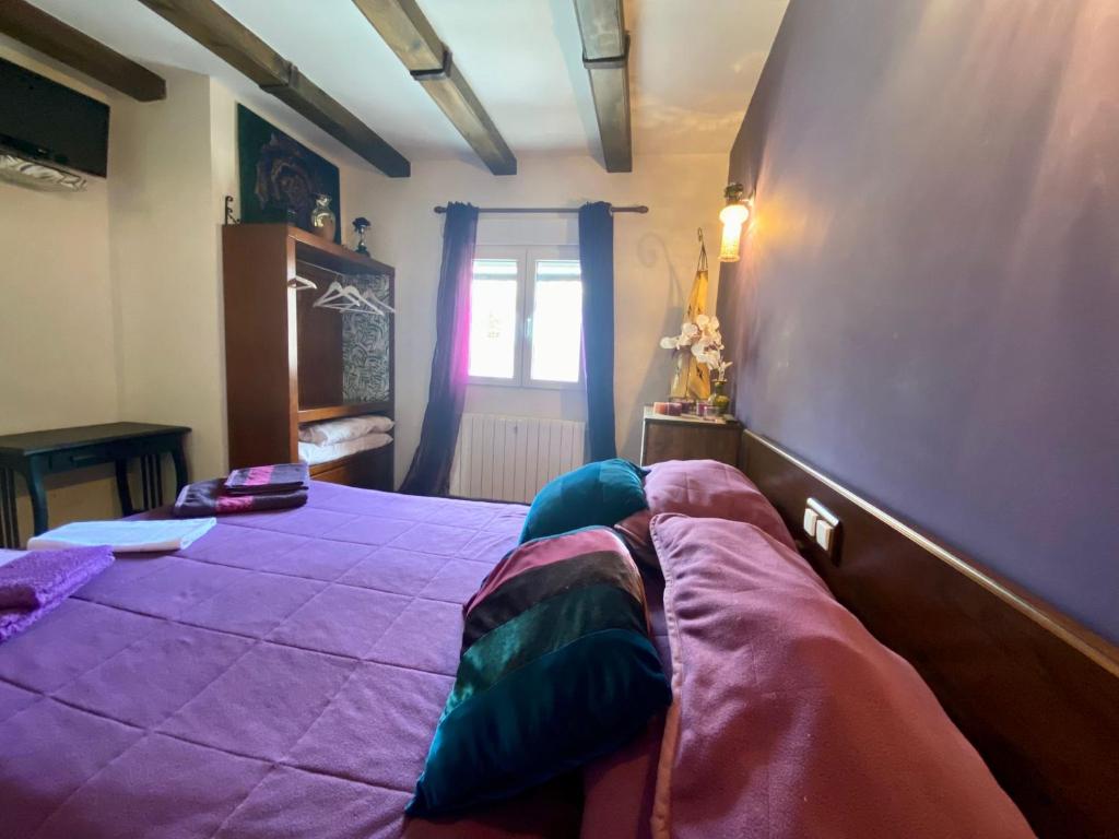 A bed or beds in a room at Raices