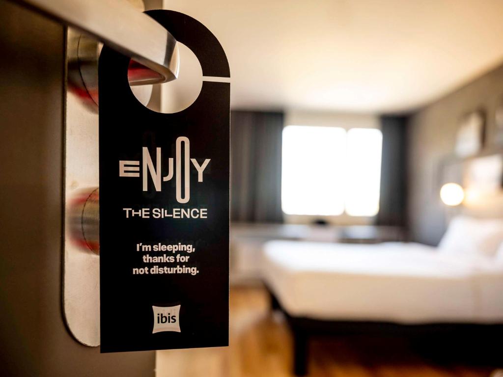 Posteľ alebo postele v izbe v ubytovaní ibis Zurich Adliswil