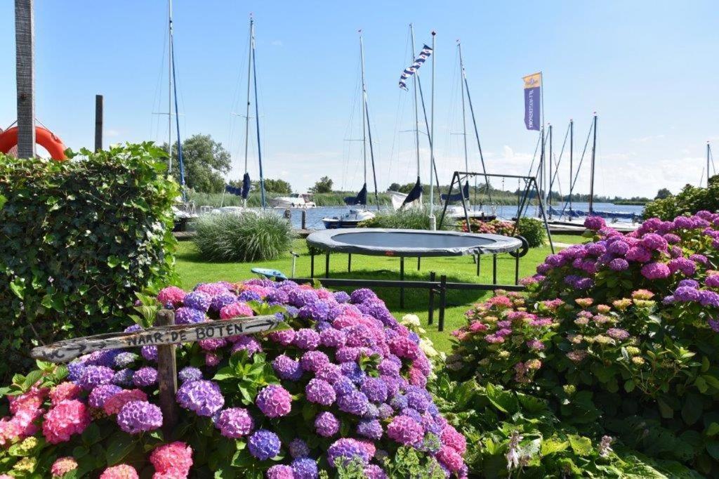 Zahrada ubytování Het Toppunt groot vakantiehuis aan het water