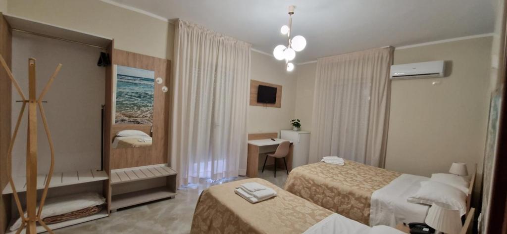 Posteľ alebo postele v izbe v ubytovaní Hotel Sole