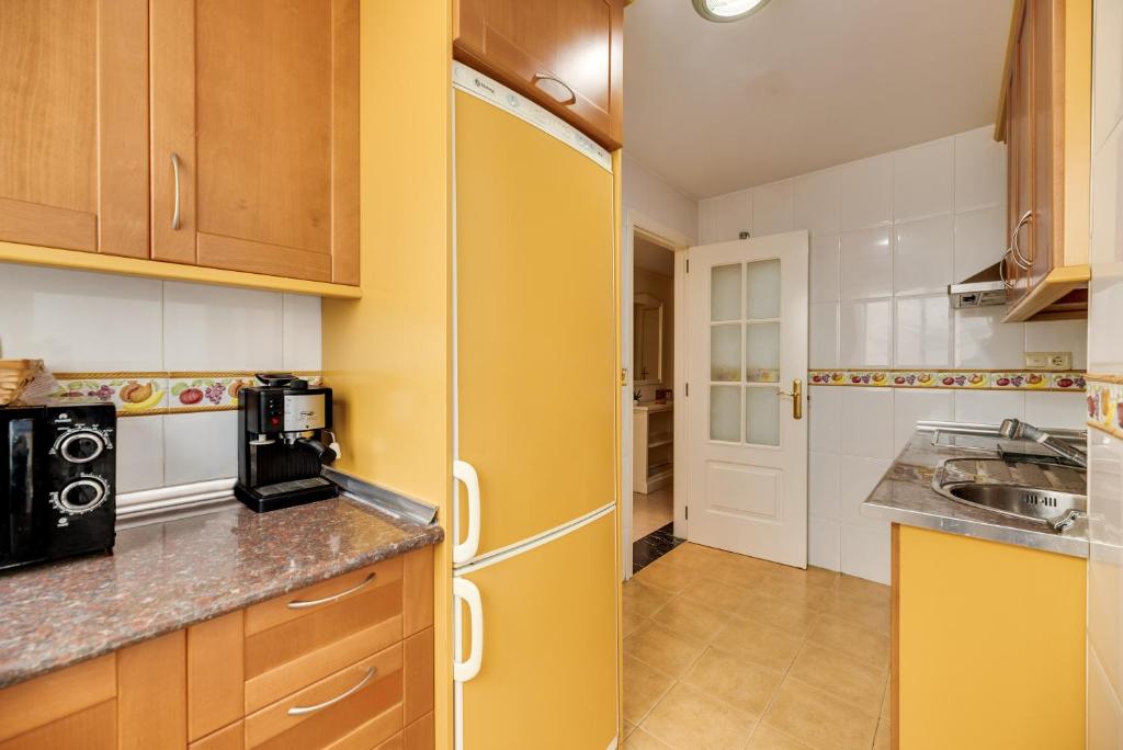 Kuchyň nebo kuchyňský kout v ubytování Apartamento Banana
