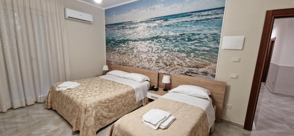 Posteľ alebo postele v izbe v ubytovaní Hotel Sole