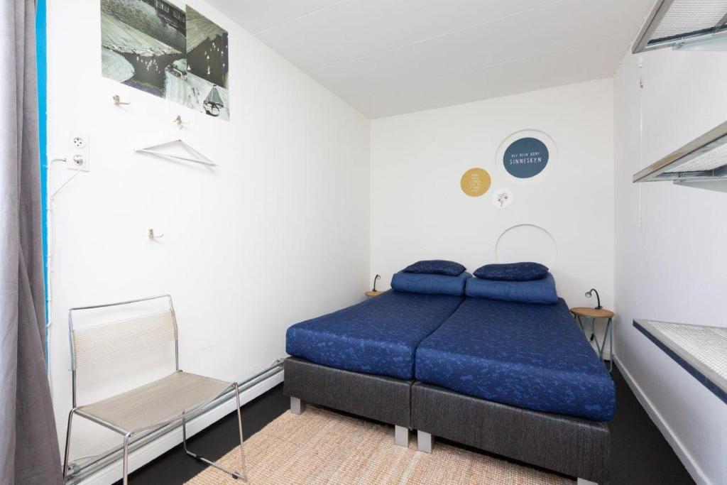 Posezení v ubytování Het Toppunt groot vakantiehuis aan het water