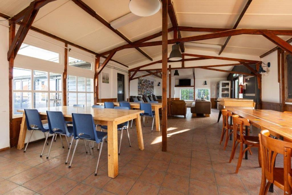 Restaurace v ubytování Het Toppunt groot vakantiehuis aan het water