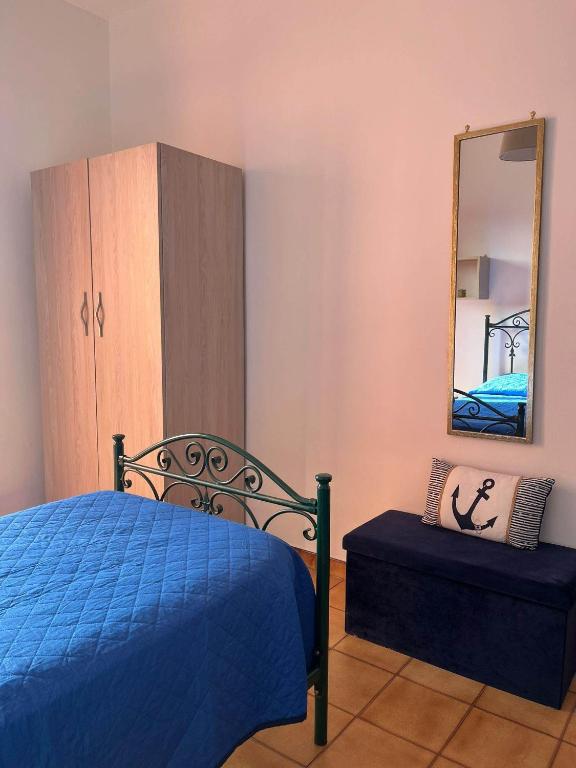 Łóżko lub łóżka w pokoju w obiekcie Caravaggio Apartment