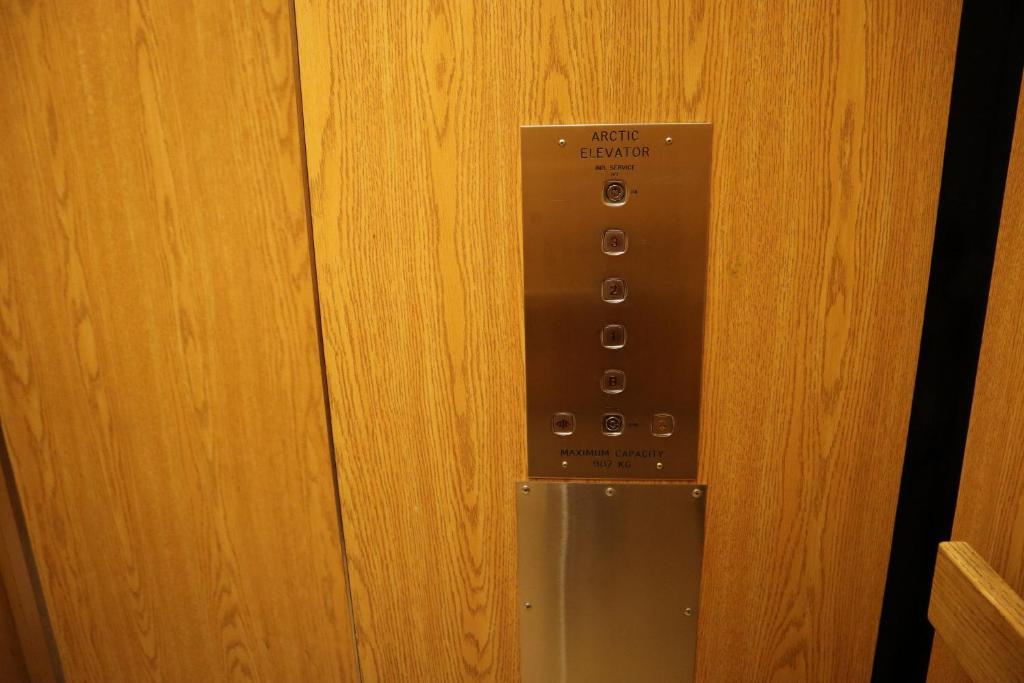 a close up of a control panel on a door at Destination Family Hotel in Whitehorse
