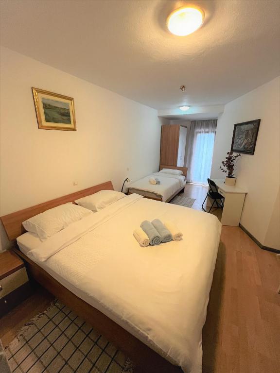 Postel nebo postele na pokoji v ubytování Rooms Balkovec