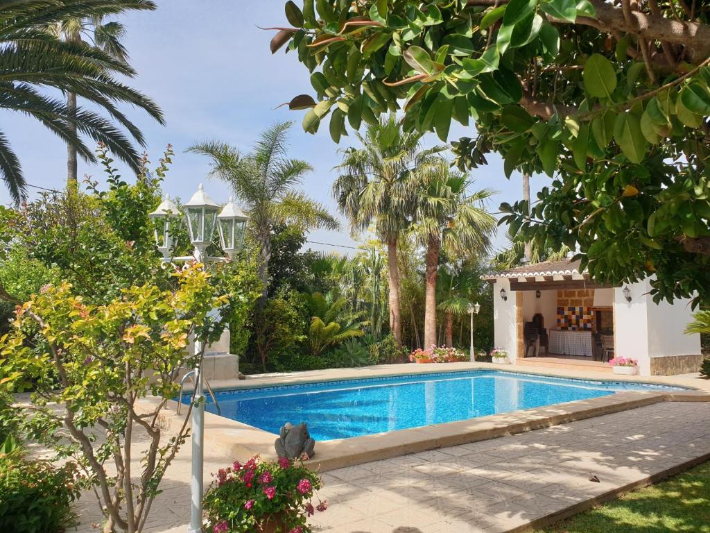 The swimming pool at or close to Casa Juanita