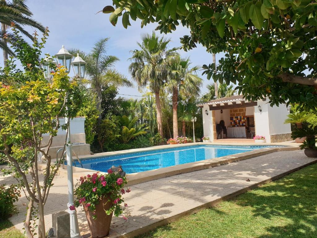 The swimming pool at or close to Casa Juanita