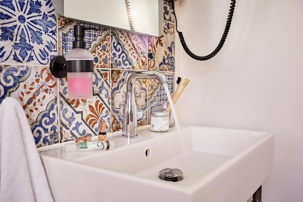 Hotel am Chlodwigplatz - Resim 16