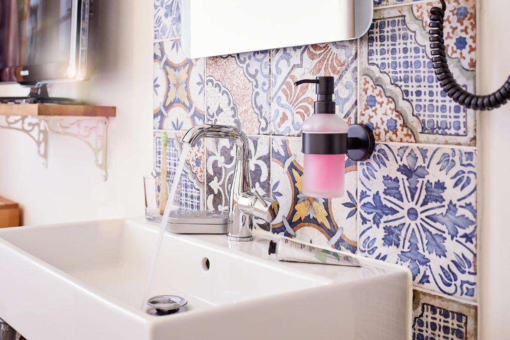 Hotel am Chlodwigplatz - Resim 5