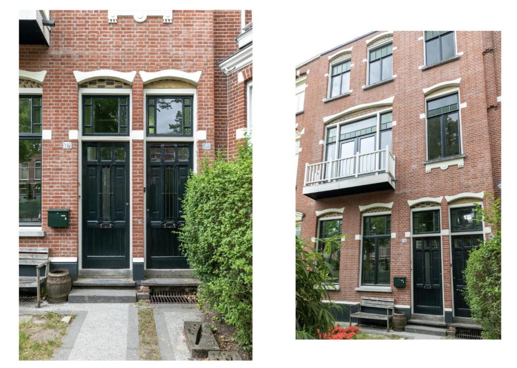 an image of a brick building with a black door at Mastbos Guesthouse Breda in Breda