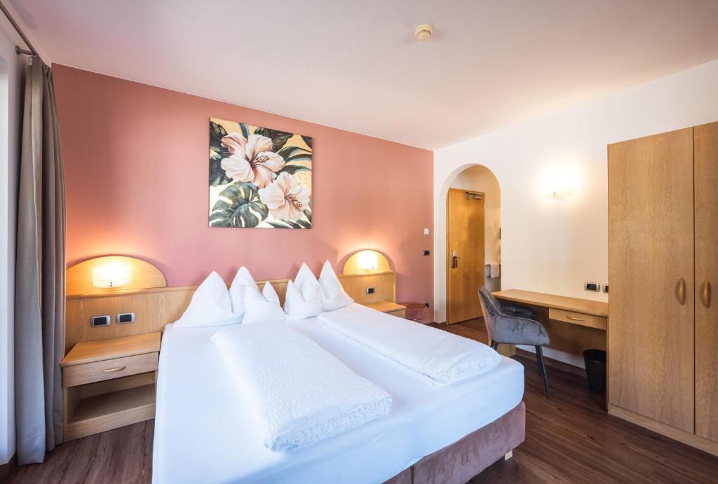 Postel nebo postele na pokoji v ubytování Hotel Bischofhof - Bistro Jasmin